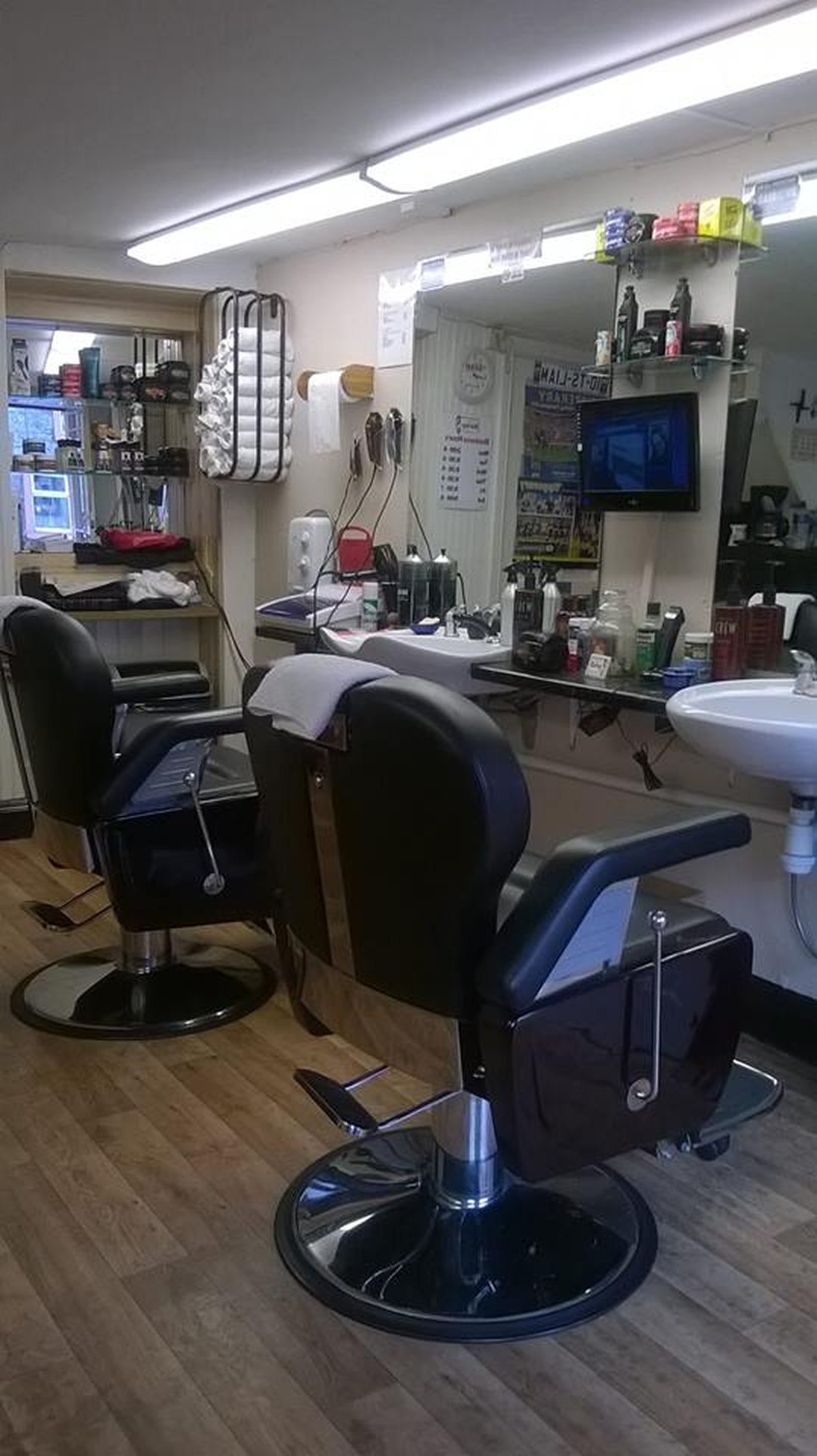 Barber chairs and workstations inside Joe’s Barber Shop, Cashel